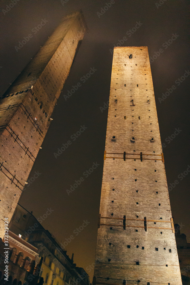 Asinelli Tower. Bologna - Italy - Due Torri. At night with fog.
