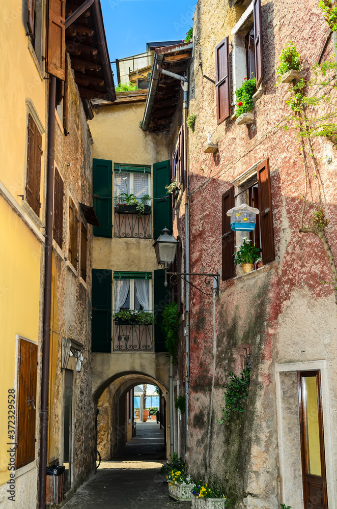 Old narrow streets of the city of Torri del Benaco. Northern Italy, Lake Garda