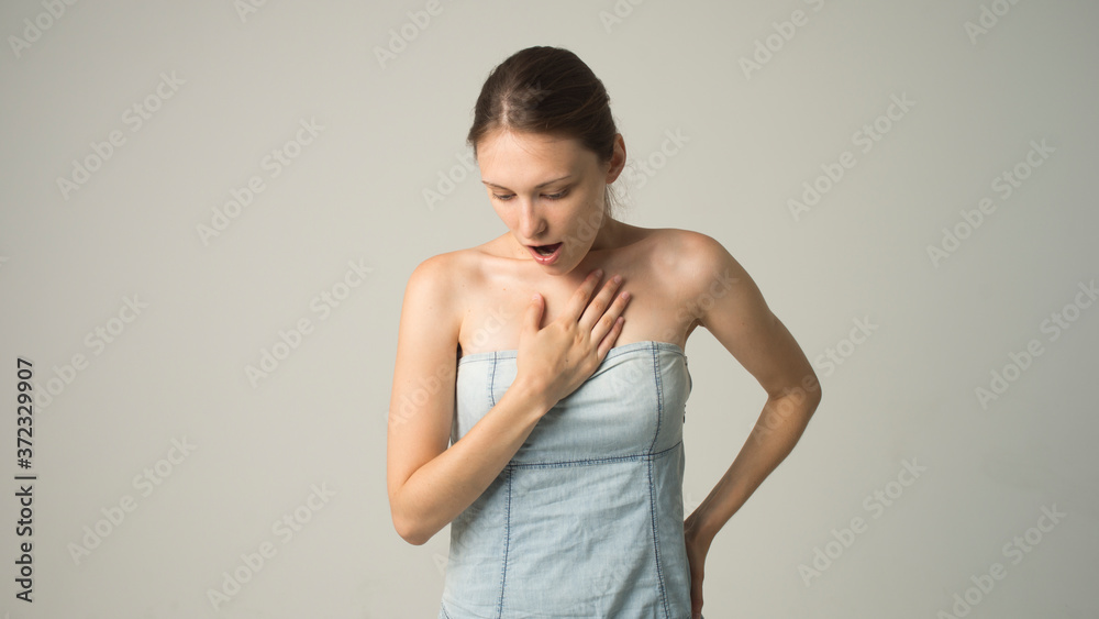 beautiful girl on a gray background beautiful girl on a gray background