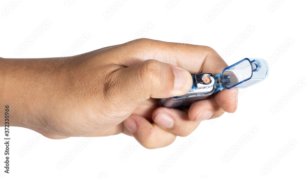 Hand hold lighter isolated on white background