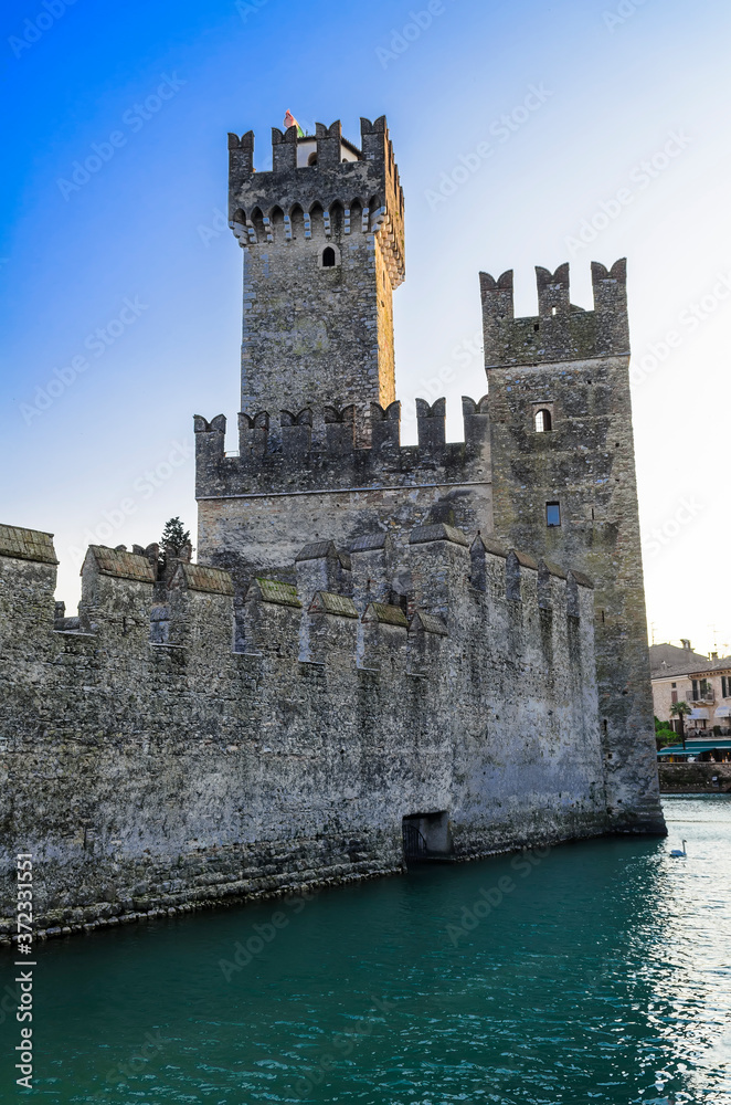 Rocca Scaligera. Unique 13th-century castle surrounded by water, with steep climbs leading to scenic lake views. Sirmione,Lake Garda,Italy