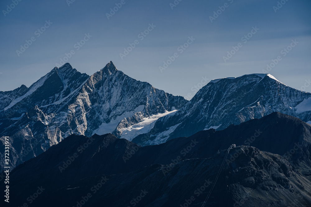 Famous alpine summits os Alphubel, Taschhorn and Dom. Swiss alpine mountain landscape with 4000 m peaks. Saas-Fee and Zermatt, Switzerland.