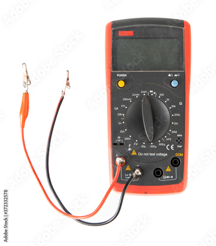 red lcr Digital Multimeter with probes on white background