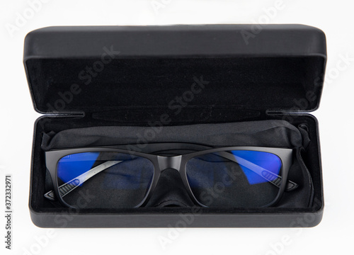 glasses in a case, leather box packaging white isolated background