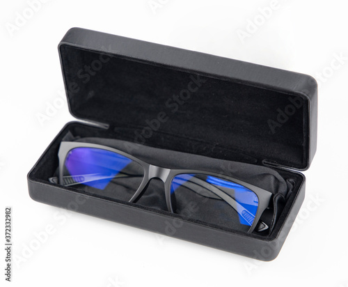 glasses in a case, leather box packaging white isolated background