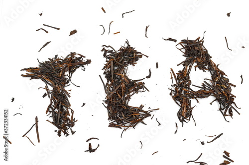 Pile of black tea isolated on white background. Dry black tea isolated