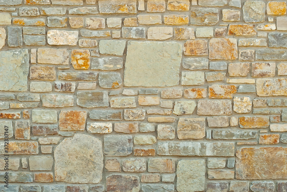 Texture of brick wall and concrete blocks. Samples of stone plates stacked evenly in a row. Texture of brick wall and concrete blocks. Samples of stone plates stacked evenly in a row.