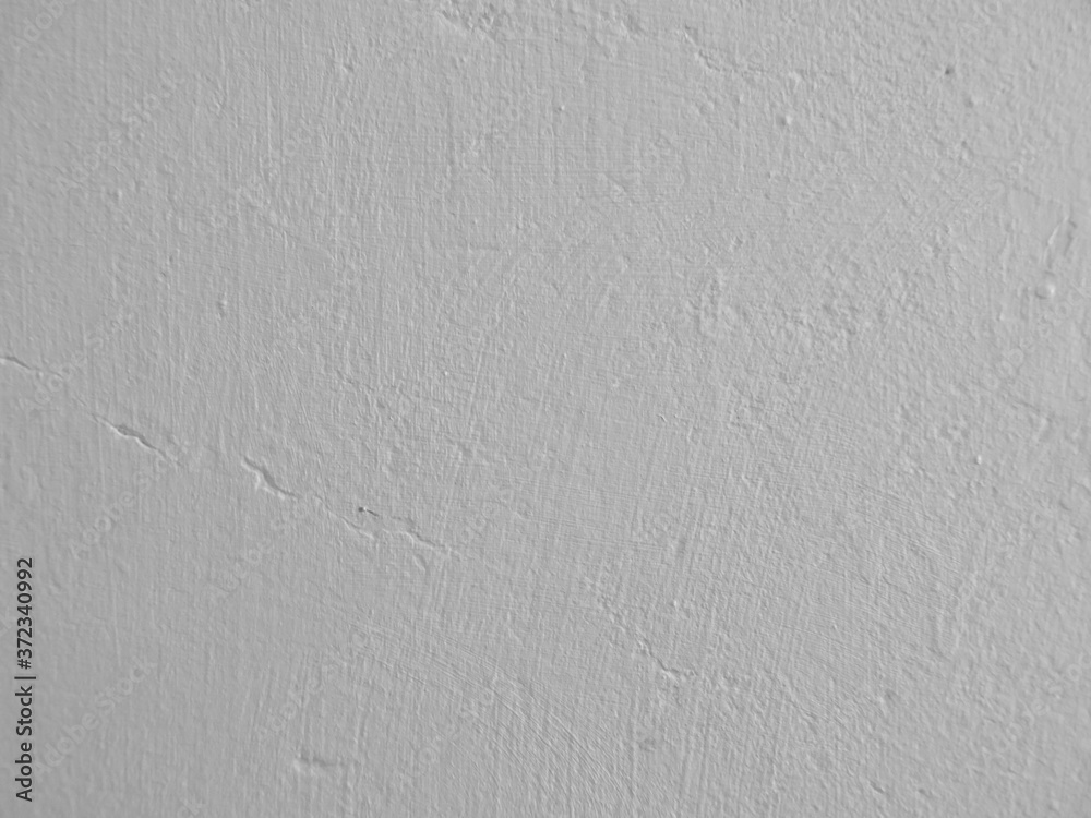 light grey painted plaster wall background with brush marks texture light grey painted plaster wall background with brush marks texture