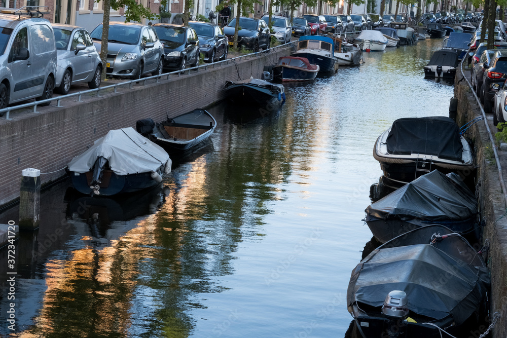 Parking problems both for cars and boats. City reserved parking with permission and annual fee.