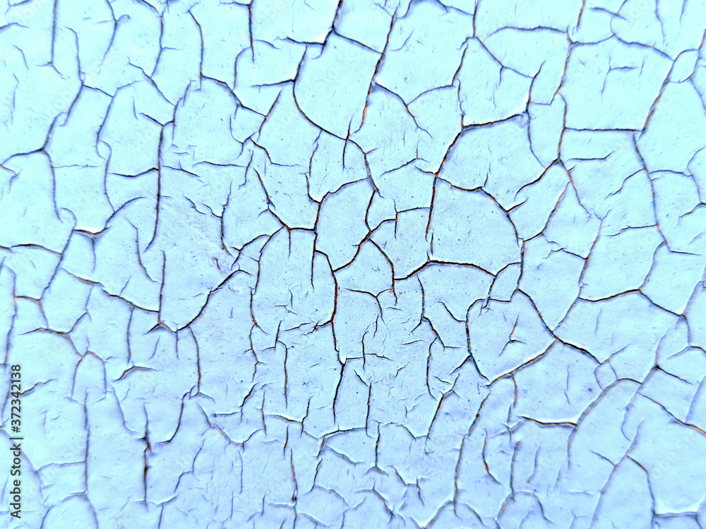 Photograph of the texture of old paint. Texture for the interior in the loft style. Cracked paint.