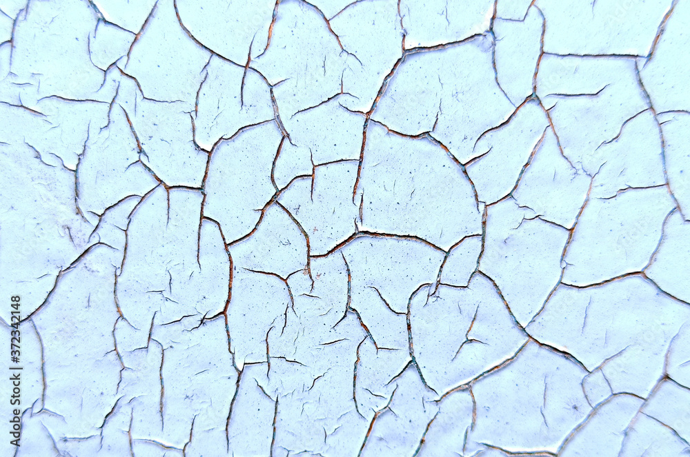 Photograph of the texture of old paint. Texture for the interior in the loft style. Cracked paint.