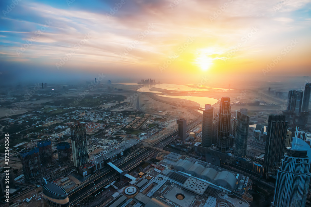 Dubai skyline at sunrise, United Arab Emirates, beautiful morning in UAE, view from above.