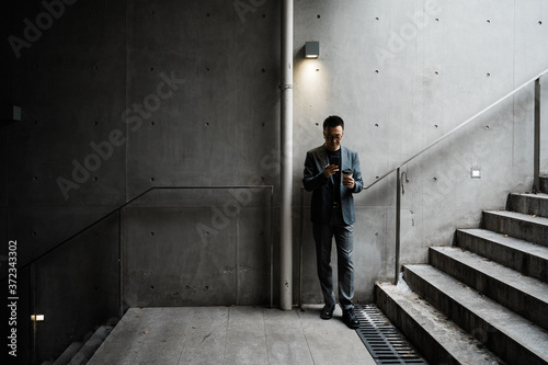 Businessman using cell phone