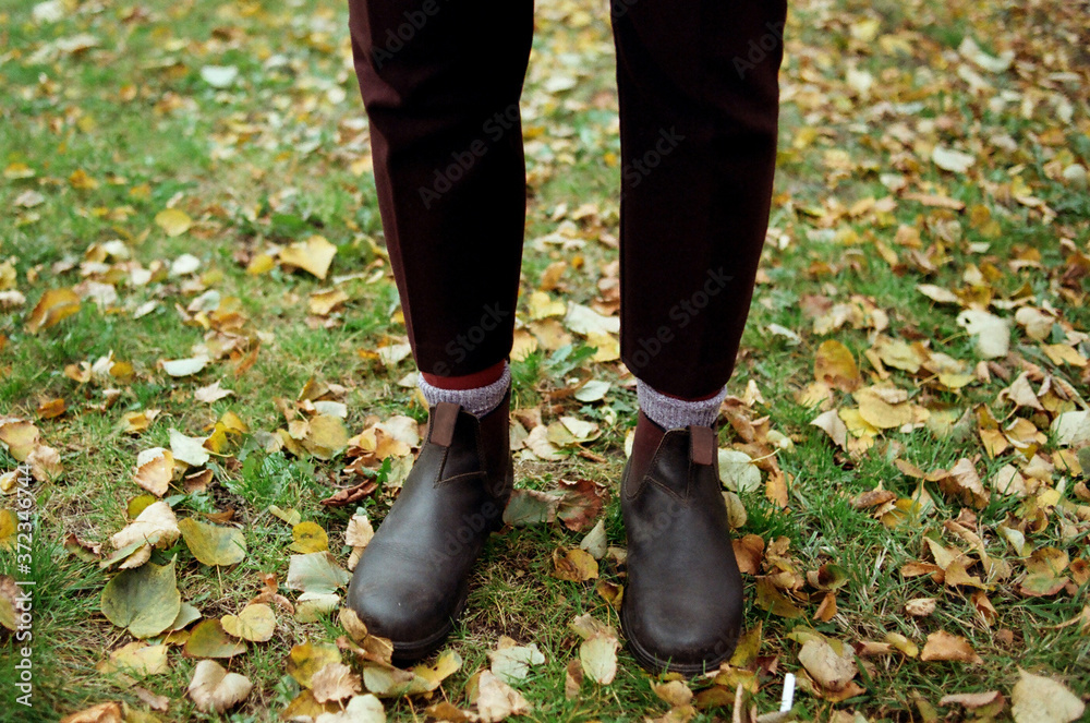 Woman having a walk in autumn park Woman having a walk in autumn park