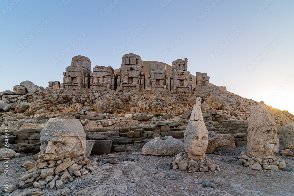 Fototapeta premium Statues on top of the Nemrut Mountain in Adiyaman, Turkey. To watch the sun set and rise.