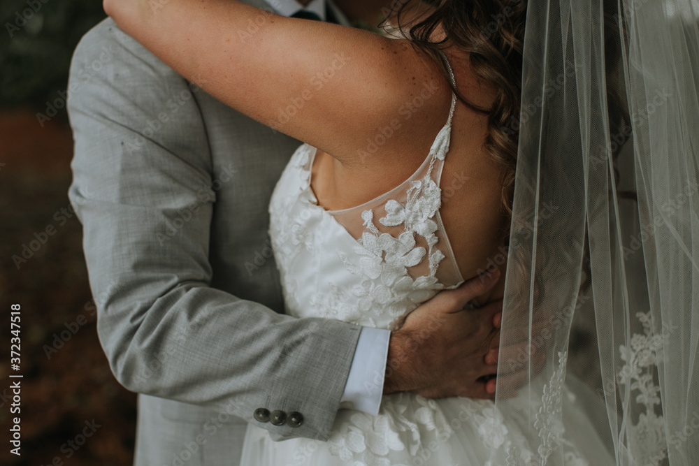 Bride and Groom in Sweet Embrace Bride and Groom in Sweet Embrace