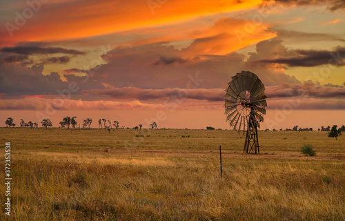 Australian sunset with a windmill