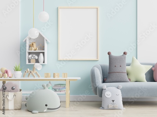 Blue sofa and doll,cute pillows in elegant child's room with posters on the wall. © Vanit่jan