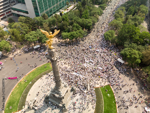Vista aérea, sobre el Angel de la Independencia, de la marcha y manifestación contra Andrés Manuel López Obrador en el Paseo de la Reforma, CDMX photo