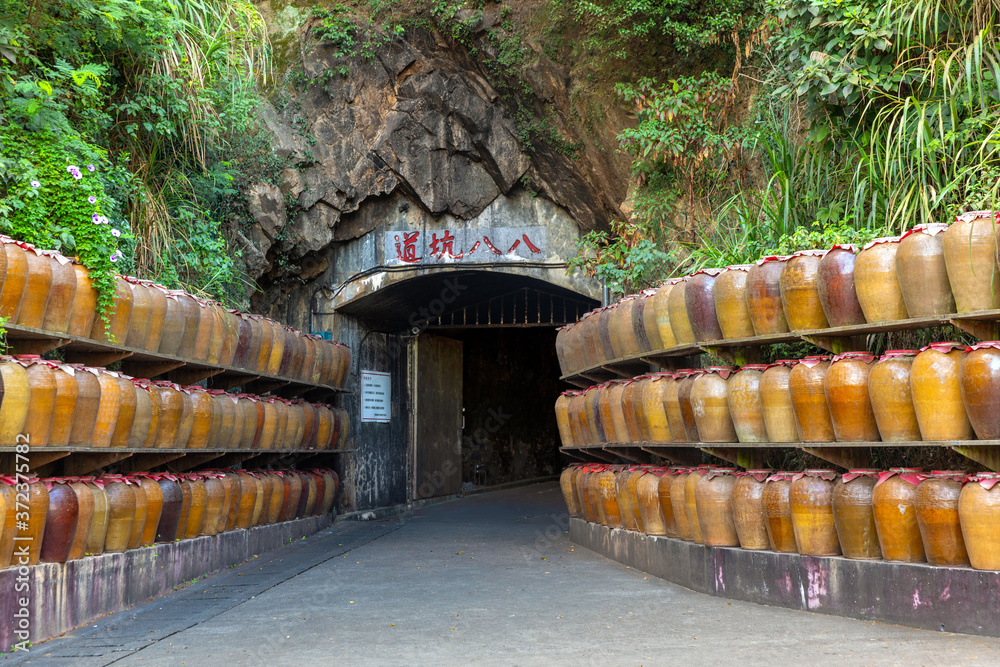 Tunnel 88, used for storage of locally distilled alcohol and spirits, tourist attraction on Nangan Island of Matsu in Taiwan. The Chinese text on the tablet: