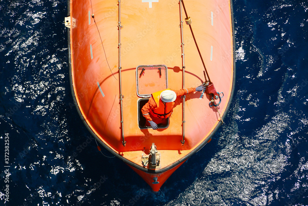 A lifeboat or life raft carried for emergency evacuation in the event ...