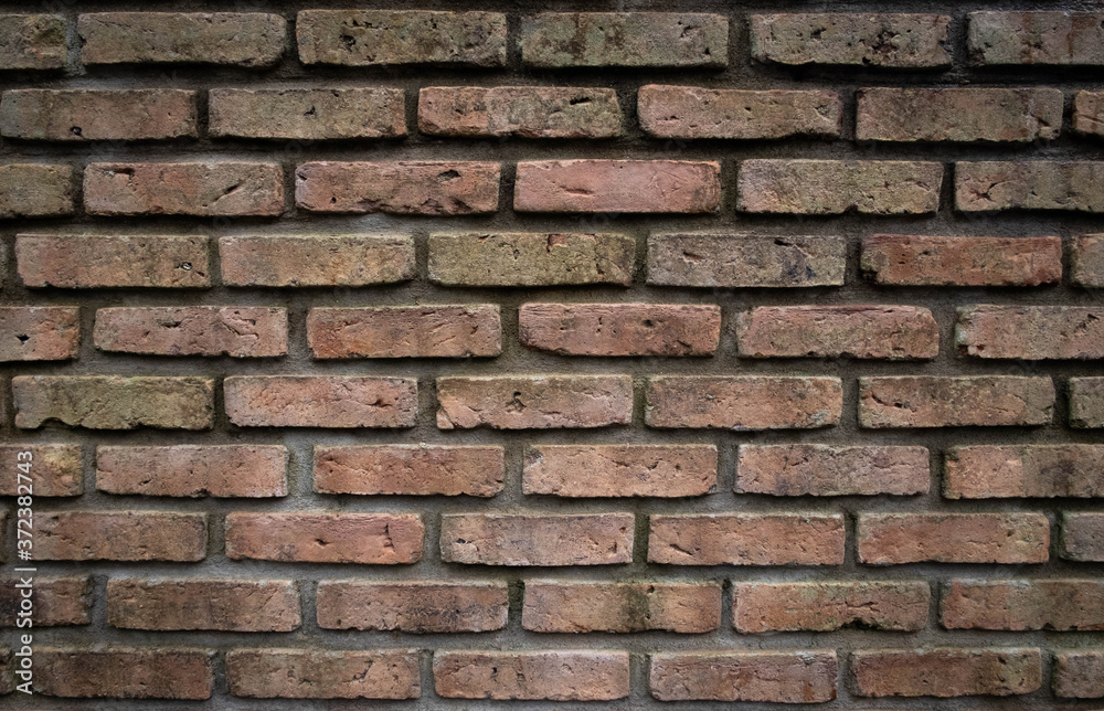 Brick wall grunge background. Old dark stone, vignette texture, Abstract surface Brown rough brick wall pattern. Vintage concrete, cement brickwork. Blank copy space for design backdrop. Brick wall grunge background. Old dark stone, vignette texture, Abstract surface Brown rough brick wall pattern. Vintage concrete, cement brickwork. Blank copy space for design backdrop.