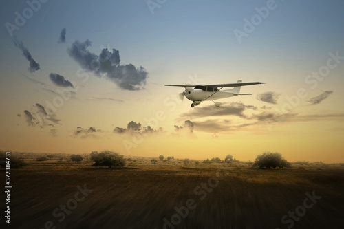 Aircraft flying in the air above the landscape