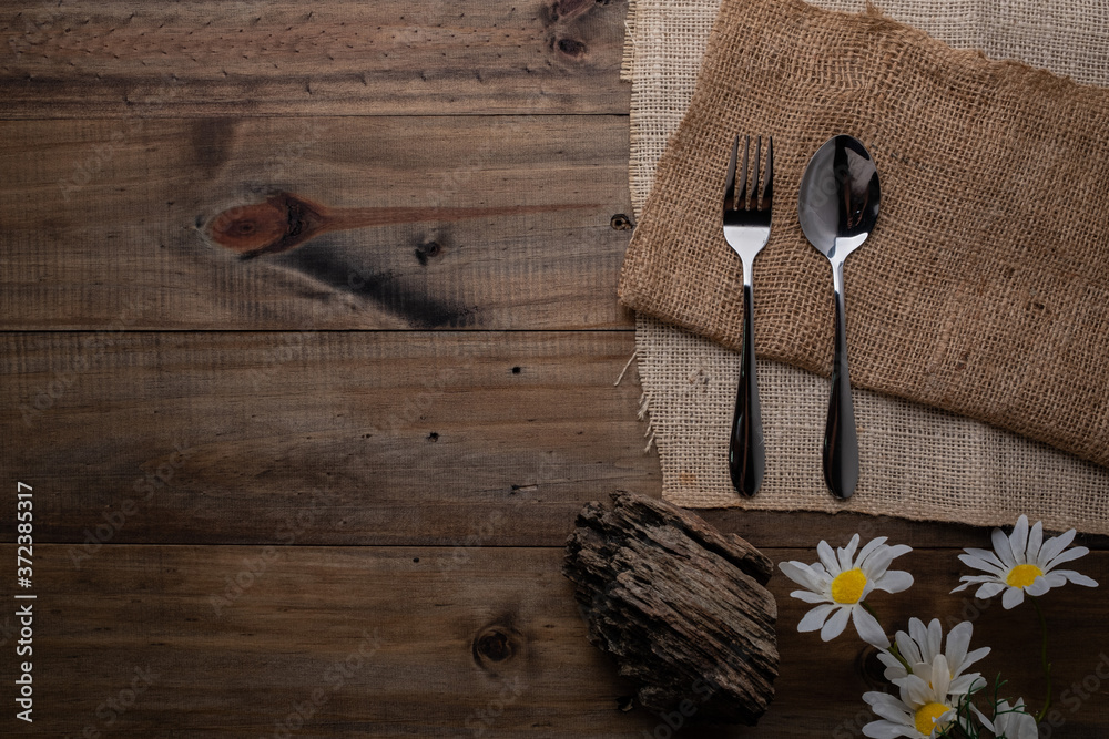 spoon and fork on wood background, cutlery
spoon and fork on wood background, cutlery