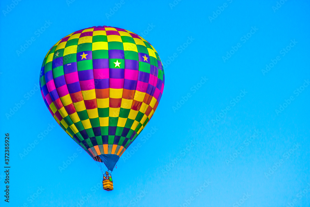 Fototapeta premium Colorful Checkered Hot Air Balloon