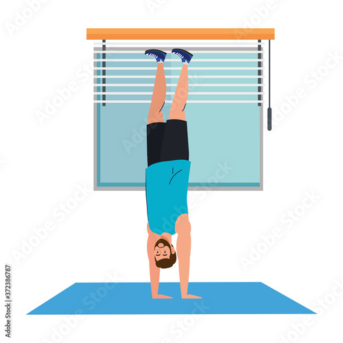 man standing on the hands, in the house, sport recreation exercise vector illustration design