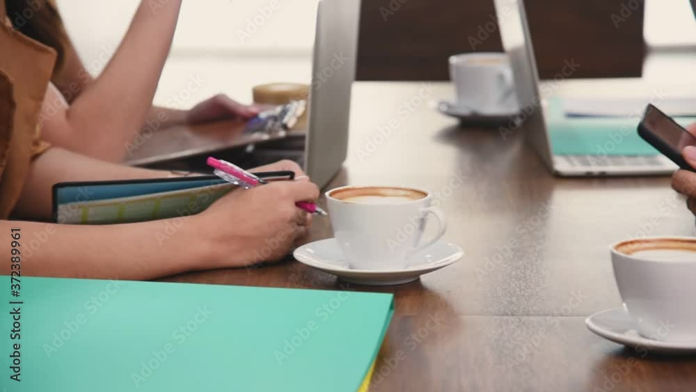 Group of people in business people meeting at coffee cafe shop restaurant talking and discuss about work progress or make a deal with customers Group of people in business people meeting at coffee cafe shop restaurant talking and discuss about work progress or make a deal with customers