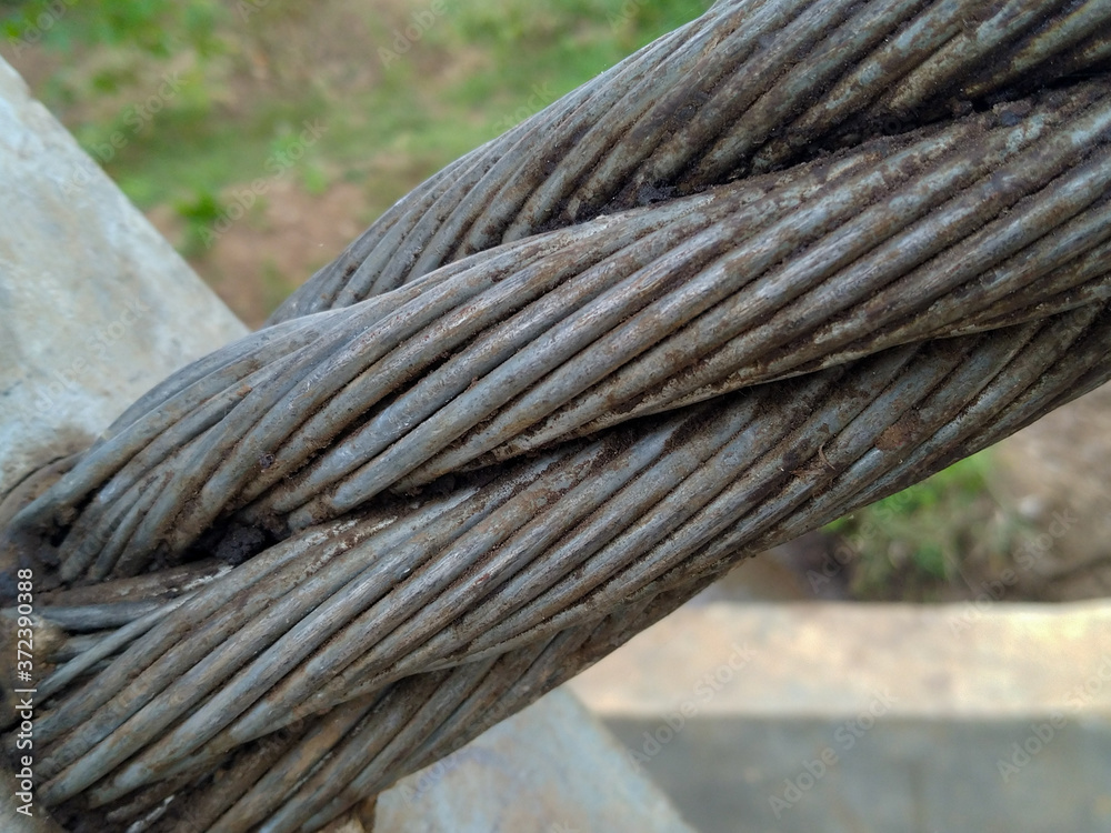 Fototapeta premium steel cables on the suspension bridge. close up