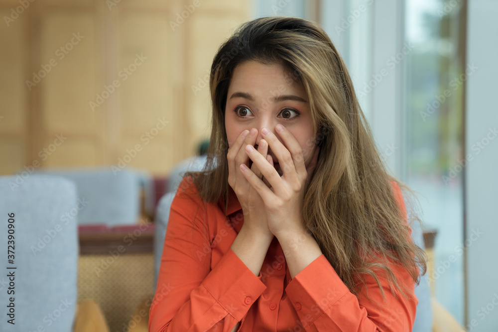 Portrait of young asian woman with happy screaming surprised face Portrait of young asian woman with happy screaming surprised face