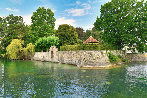 Public park with canal called 'Stadtgarten' located at Lake Constance near harbor of Konstanz city in Germany