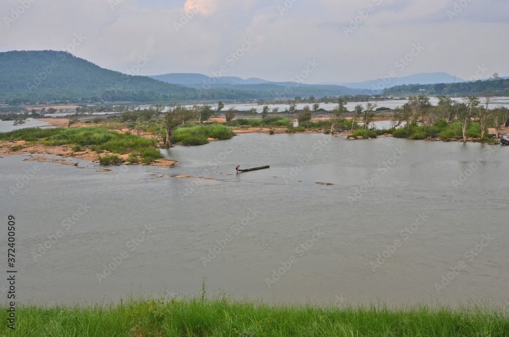 Cataract island in the wide river in southeast of Thailand Cataract island in the wide river in southeast of Thailand