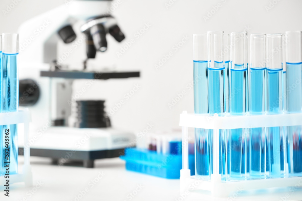 Test tubes on table in laboratory Test tubes on table in laboratory