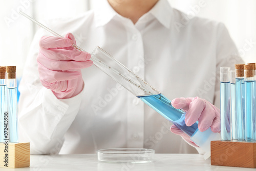 Scientist working with samp...