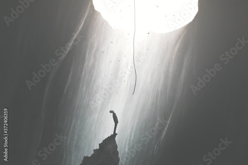 illustration of man finding a way to get out of darkness, rope from the sky, surreal concept photo