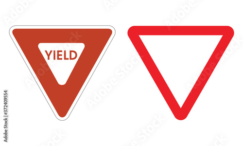 Yield road sign set. Vector illustration of American and European yield traffic sign isolated on white background. Red and white triangular board with rounded corners. Flat design.