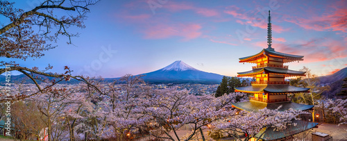 Mountain Fuji and Chureito red pagoda with cherry blossom sakura photo