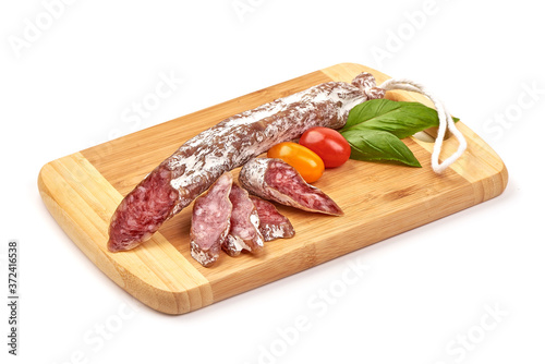 Fuet sausage, jerked meat with mold, isolated on white background