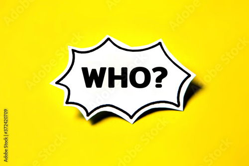 who speech bubble on white paper isolated on yellow paper background with drop shadow. photo