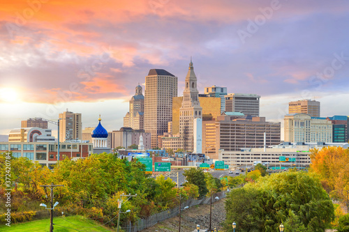 Bild auf Leinwand Skyline of downtown Hartford, Connecticut from above Charter Oak Landing at suns