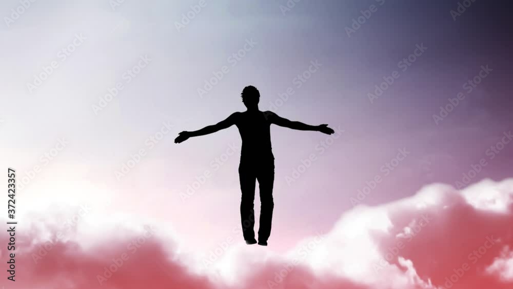 Creative 4K parallax video of the sky, moving clouds and sunlight, a silhouette of a man with arms spread apart, flying in a light and dissolving into it against the background of the Yin-Yang symbol.