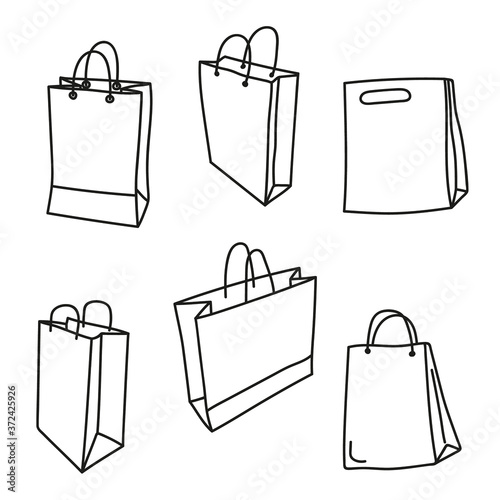 Set of hand drawn shopping doodle bag icon. Vector sketch illustration.