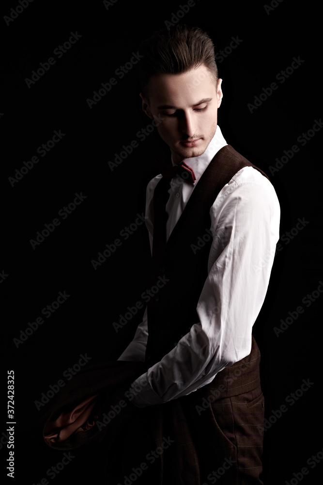 groom in a classic suit groom in a classic suit