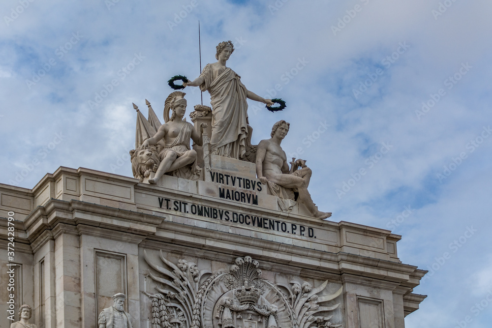 Sculptures on top of the Augusta Street Arch (Arco da Rua Augusta) located near Praca do Comercio in Lisbon, Portugal.