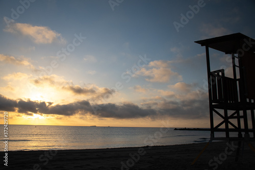 A lifeguard tower during sunrise © nazareth