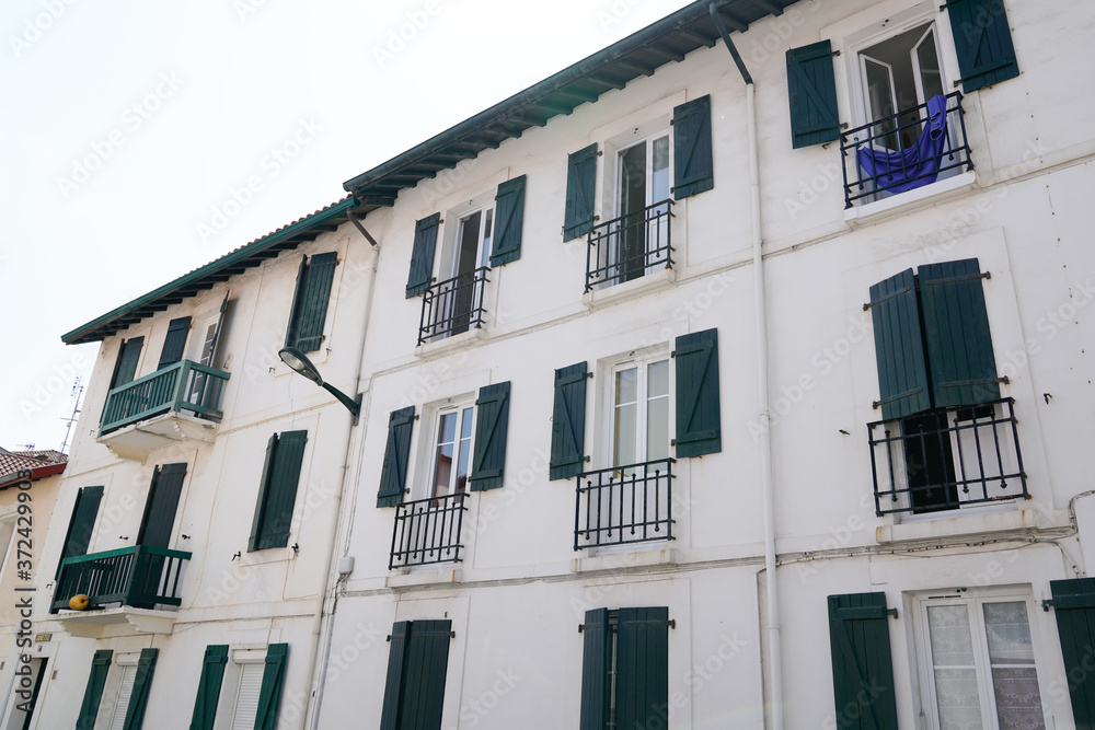 Naklejka premium typical Basque country green shutters house in france and spain