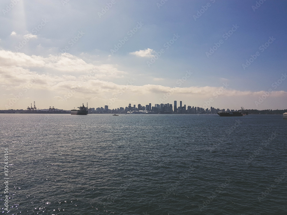 Vancouver skyline with ships seen from north during daytime at summer.